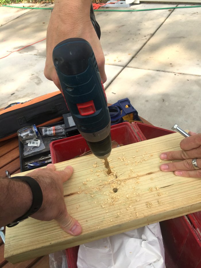 drilling pilot holes in wood stand